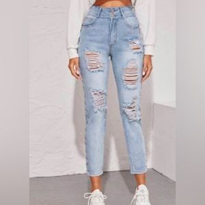 Shien ripped jeans with studs on the side